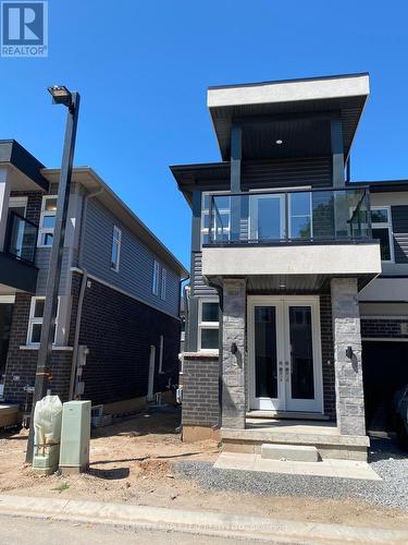 37 - 5672 Dorchester Road, Niagara Falls, ON - Outdoor With Balcony With Facade