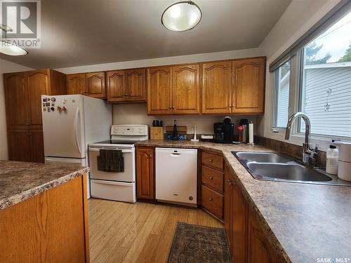 1116 Coteau Avenue, Weyburn, SK - Indoor Photo Showing Kitchen With Double Sink