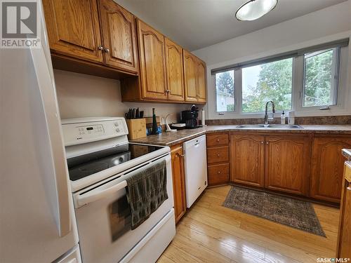 1116 Coteau Avenue, Weyburn, SK - Indoor Photo Showing Kitchen With Double Sink