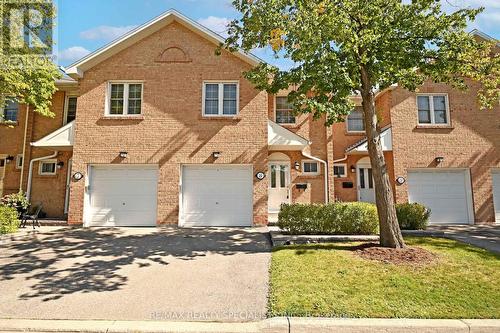 8 - 1951 Rathburn Road E, Mississauga, ON - Outdoor With Facade