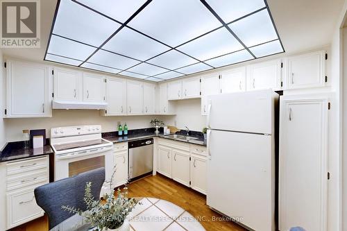 8 - 1951 Rathburn Road E, Mississauga (Rathwood), ON - Indoor Photo Showing Kitchen With Double Sink