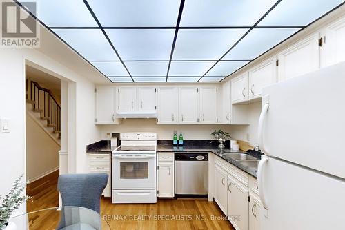 8 - 1951 Rathburn Road E, Mississauga (Rathwood), ON - Indoor Photo Showing Kitchen With Double Sink