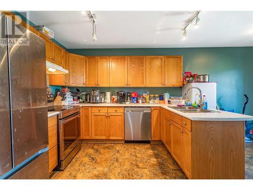 153 Snowsell Street Unit# 1, Kelowna, BC - Indoor Photo Showing Kitchen With Double Sink