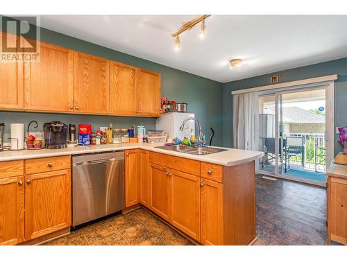 153 Snowsell Street Unit# 1, Kelowna, BC - Indoor Photo Showing Kitchen With Double Sink