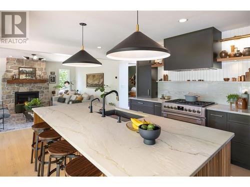 4796 Redridge Road, Kelowna, BC - Indoor Photo Showing Kitchen With Fireplace With Upgraded Kitchen