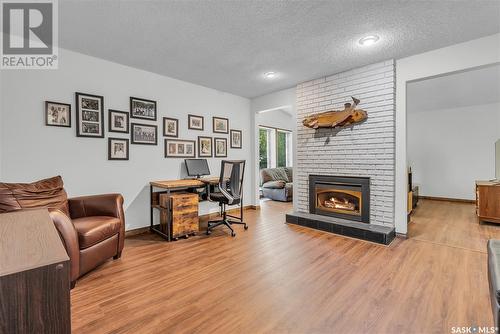 122 Meglund Place, Saskatoon, SK - Indoor Photo Showing Living Room With Fireplace