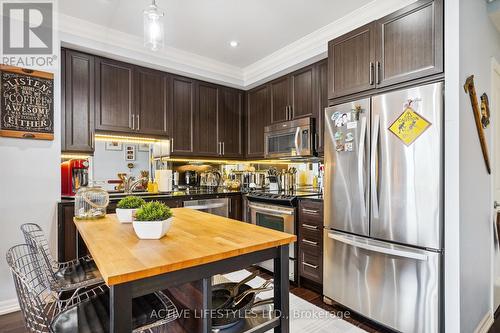 202 - 3563 Lake Shore Boulevard W, Toronto (Long Branch), ON - Indoor Photo Showing Kitchen With Stainless Steel Kitchen