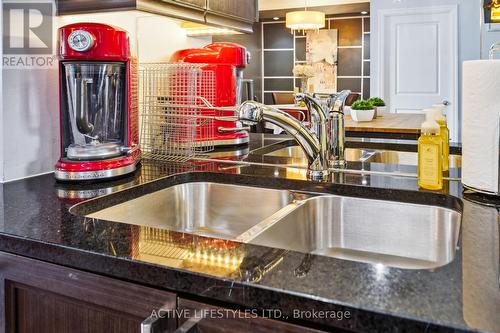 202 - 3563 Lake Shore Boulevard W, Toronto (Long Branch), ON - Indoor Photo Showing Kitchen With Double Sink