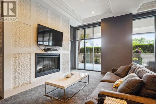 202 - 3563 Lake Shore Boulevard W, Toronto (Long Branch), ON - Indoor Photo Showing Living Room With Fireplace