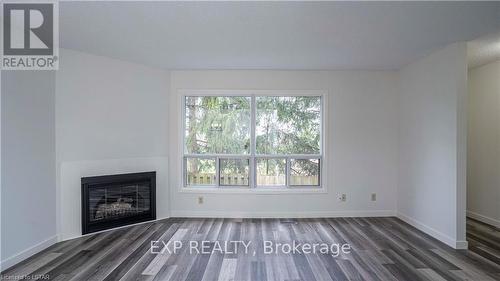 34 - 595 Third Street, London, ON - Indoor Photo Showing Living Room With Fireplace