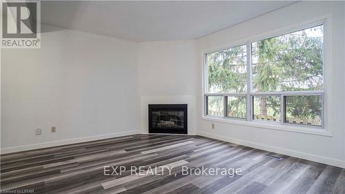 34 - 595 Third Street, London, ON - Indoor Photo Showing Other Room With Fireplace