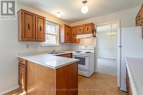 Eat-in Kitchen - 207 Mcmaster Court, London, ON - Indoor Photo Showing Kitchen With Double Sink