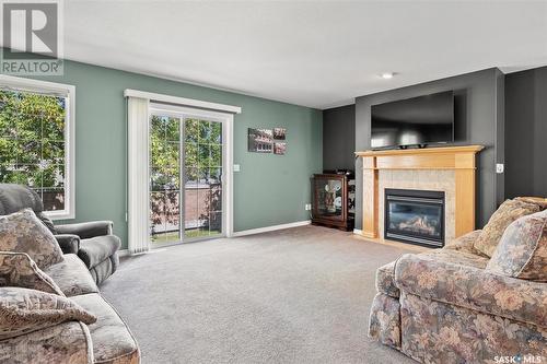 17 110 Banyan Crescent, Saskatoon, SK - Indoor Photo Showing Living Room With Fireplace