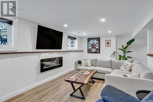 107 Pirates Glen Drive, Galway-Cavendish And Harvey, ON - Indoor Photo Showing Living Room With Fireplace