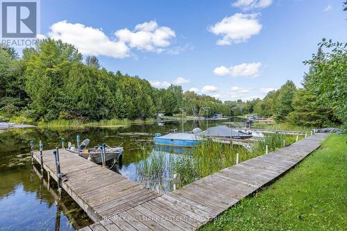 107 Pirates Glen Drive, Galway-Cavendish And Harvey, ON - Outdoor With Body Of Water With Deck Patio Veranda With View