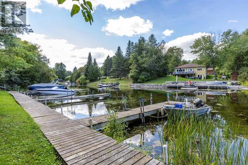 107 Pirates Glen Drive, Galway-Cavendish And Harvey, ON - Outdoor With Body Of Water With Deck Patio Veranda With View