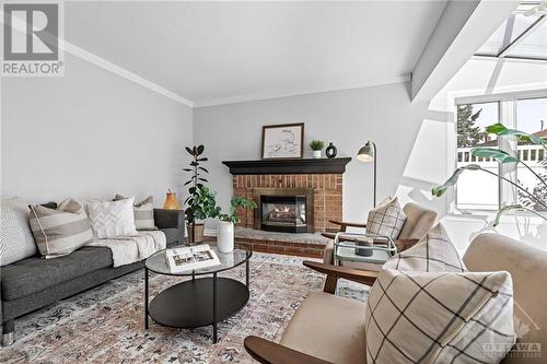 1317 Prestone Drive, Ottawa, ON - Indoor Photo Showing Living Room With Fireplace