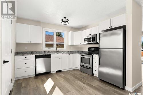 1312 Courtney Street, Regina, SK - Indoor Photo Showing Kitchen With Stainless Steel Kitchen With Double Sink