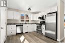 1312 Courtney Street, Regina, SK  - Indoor Photo Showing Kitchen With Stainless Steel Kitchen With Double Sink 