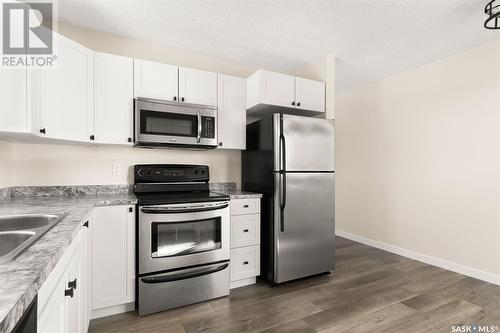 1312 Courtney Street, Regina, SK - Indoor Photo Showing Kitchen With Double Sink