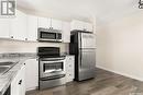 1312 Courtney Street, Regina, SK  - Indoor Photo Showing Kitchen With Double Sink 