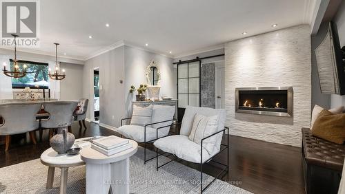 9 Delrosa Court, Toronto (Mount Olive-Silverstone-Jamestown), ON - Indoor Photo Showing Living Room With Fireplace