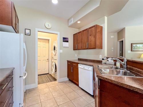 18 Bayhill Crescent, Brandon, MB - Indoor Photo Showing Kitchen With Double Sink