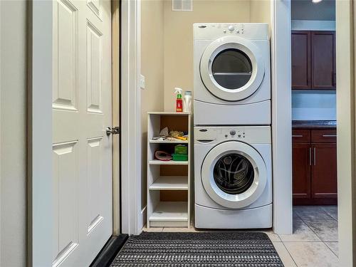 18 Bayhill Crescent, Brandon, MB - Indoor Photo Showing Laundry Room