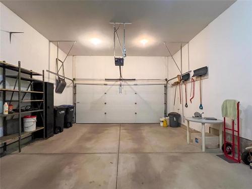 18 Bayhill Crescent, Brandon, MB - Indoor Photo Showing Garage