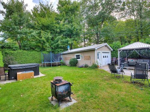 Cour - 250 Rue L'Espérance, Lavaltrie, QC - Outdoor With Backyard