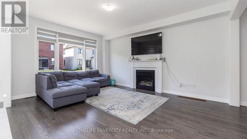 940 Sobeski Avenue, Woodstock, ON - Indoor Photo Showing Living Room With Fireplace