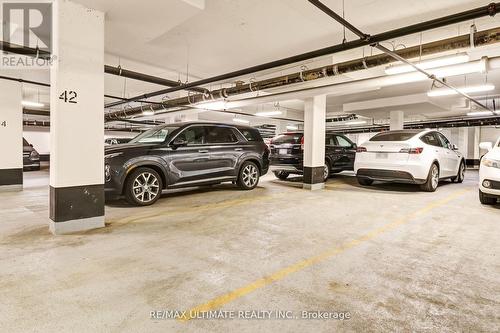 1111E - 8868 Yonge Street, Richmond Hill, ON - Indoor Photo Showing Garage