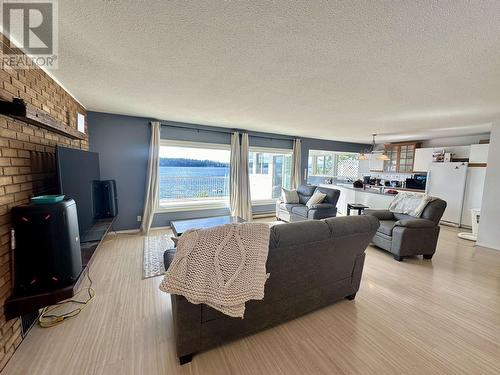 54665 Jardine Road, Cluculz Lake, BC - Indoor Photo Showing Living Room With Fireplace