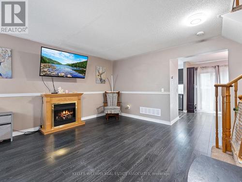 4 Greengrove Way, Whitby (Rolling Acres), ON - Indoor Photo Showing Living Room With Fireplace