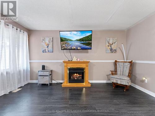 4 Greengrove Way, Whitby (Rolling Acres), ON - Indoor With Fireplace