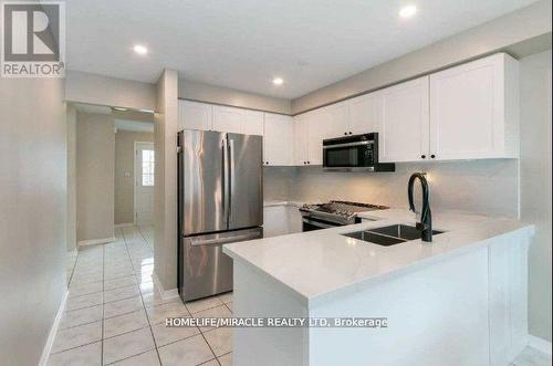 66 Hutton Place, Clarington (Bowmanville), ON - Indoor Photo Showing Kitchen With Stainless Steel Kitchen With Double Sink With Upgraded Kitchen