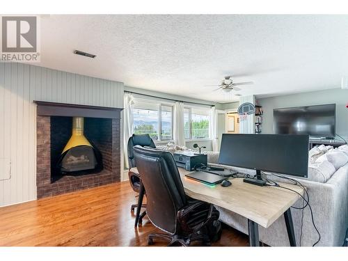 1744 Pennask Terrace, Kamloops, BC - Indoor Photo Showing Other Room With Fireplace