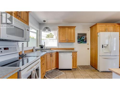 8209 Lakeview Drive, Coldstream, BC - Indoor Photo Showing Kitchen With Double Sink