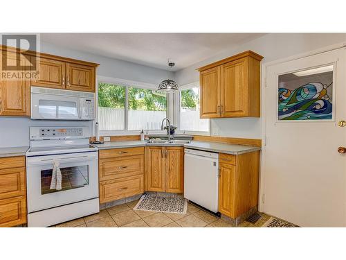 8209 Lakeview Drive, Coldstream, BC - Indoor Photo Showing Kitchen With Double Sink