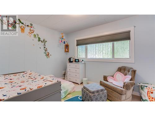 8209 Lakeview Drive, Coldstream, BC - Indoor Photo Showing Bedroom