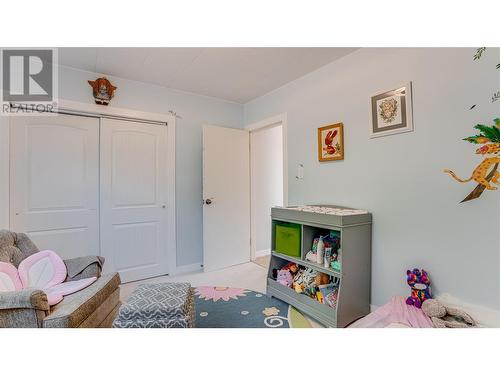 8209 Lakeview Drive, Coldstream, BC - Indoor Photo Showing Bedroom