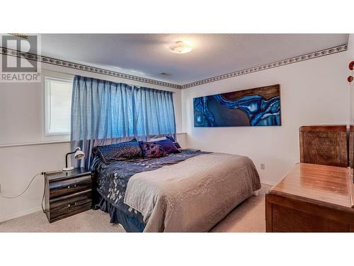 8209 Lakeview Drive, Coldstream, BC - Indoor Photo Showing Bedroom