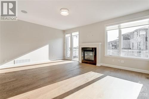 133 Boundstone Way, Kanata, ON - Indoor Photo Showing Living Room With Fireplace