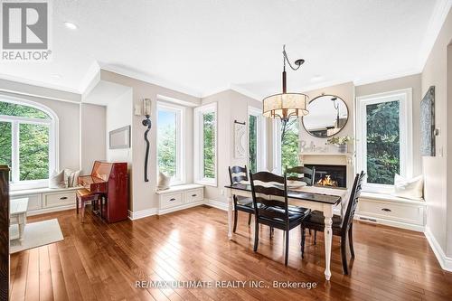 44 Stagecoach Circle, Toronto, ON - Indoor Photo Showing Dining Room With Fireplace