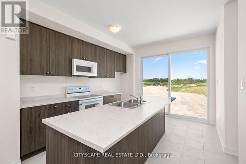 29 Sama Way, Wasaga Beach, ON - Indoor Photo Showing Kitchen With Double Sink