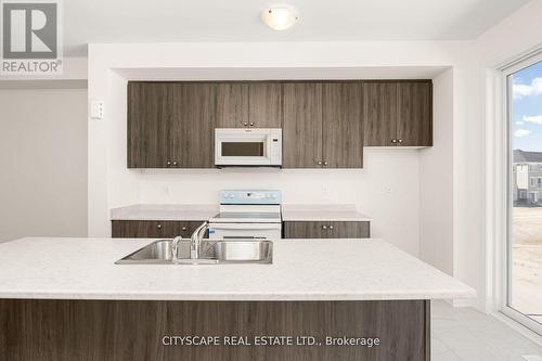 29 Sama Way, Wasaga Beach, ON - Indoor Photo Showing Kitchen With Double Sink