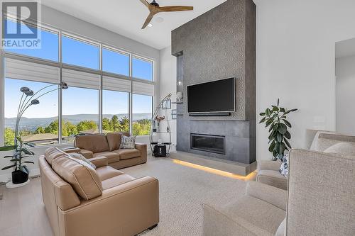 484 Sparrow Hawk Court, Kelowna, BC - Indoor Photo Showing Living Room With Fireplace