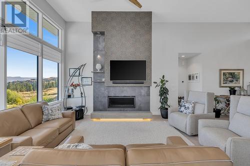 484 Sparrow Hawk Court, Kelowna, BC - Indoor Photo Showing Living Room With Fireplace