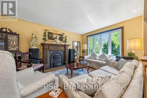 1216 Falgarwood Drive, Oakville (Iroquois Ridge North), ON - Indoor Photo Showing Living Room With Fireplace