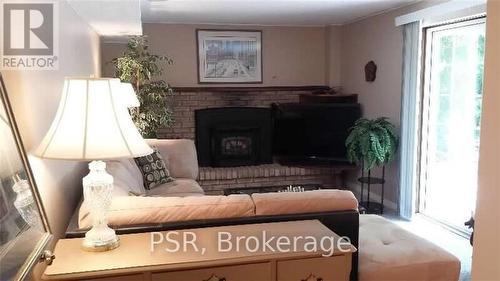 1216 Falgarwood Drive, Oakville (Iroquois Ridge North), ON - Indoor Photo Showing Living Room With Fireplace